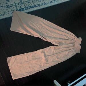 Beige Ruched pants. Flows. Size medium but stretches a lot as shown in pic.